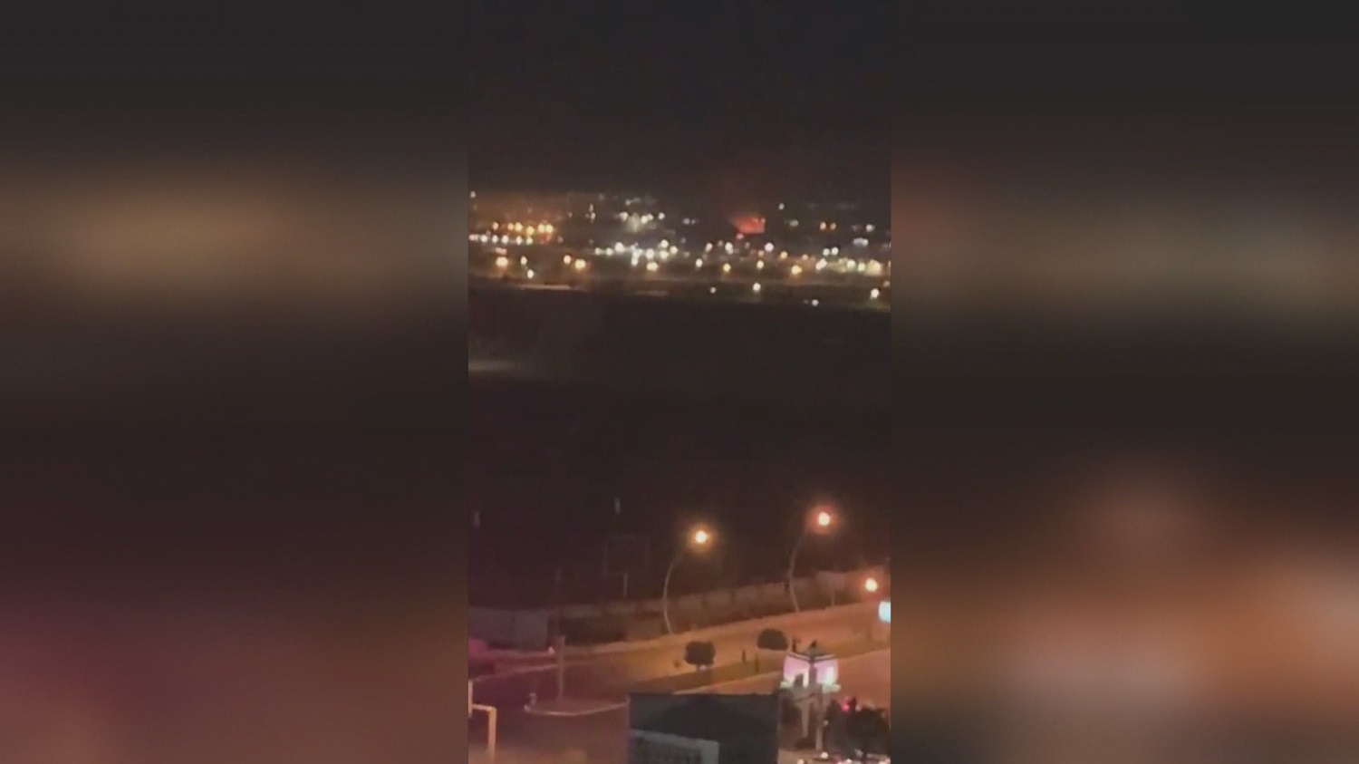 A blast from an explosive-laden drone sparked a fire at Erbil International Airport on April 14, 2021. Photo: screengrab